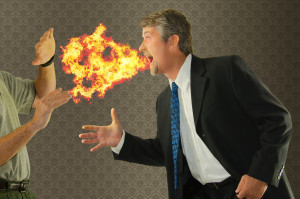 Bad breath chronic halitosis humor with a man breathing fire on someone as he goes to shake hands.