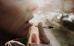 Woman Smoking A Marijuana Joint
